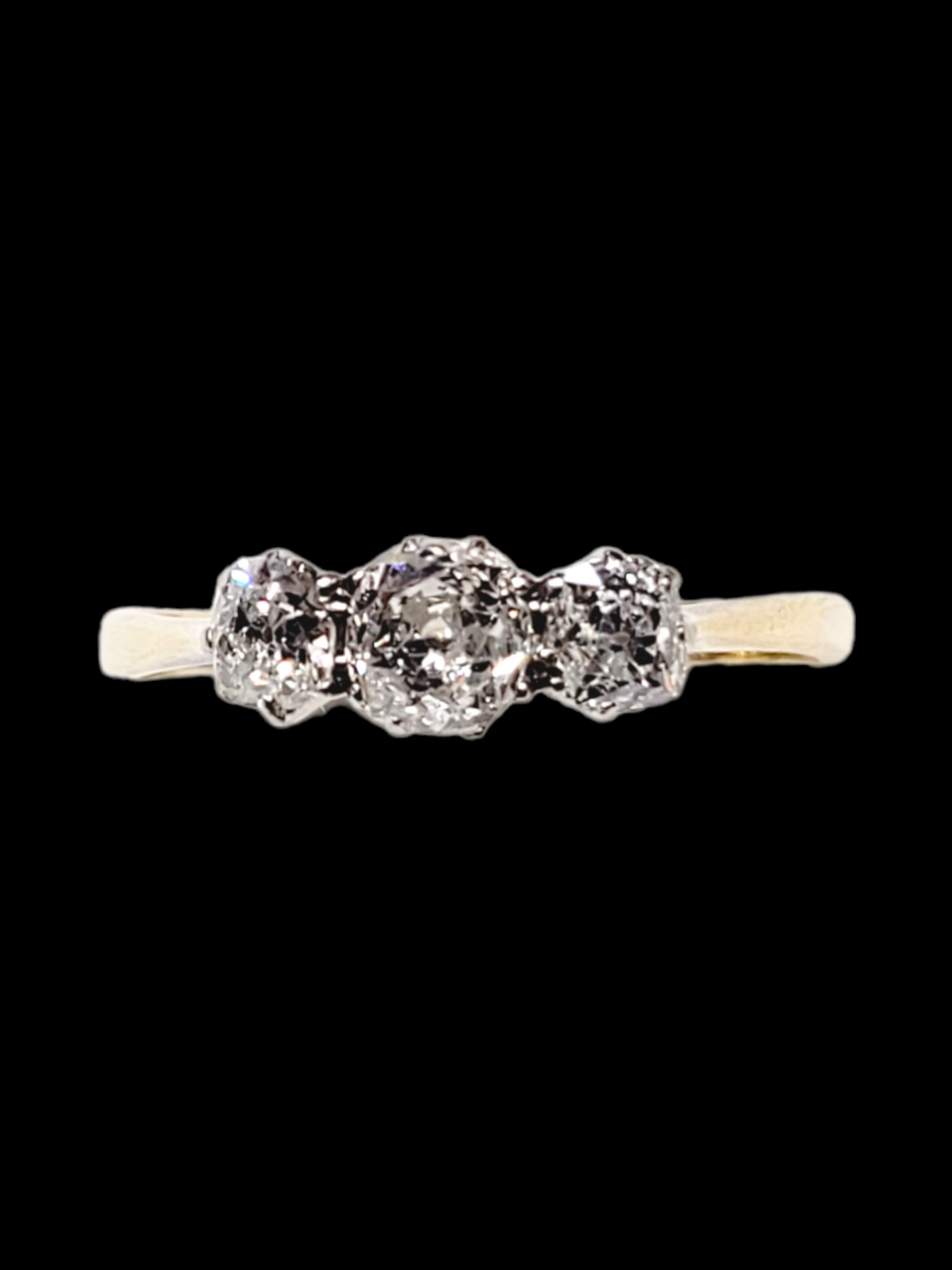 Antique trilogy diamond engagement ring