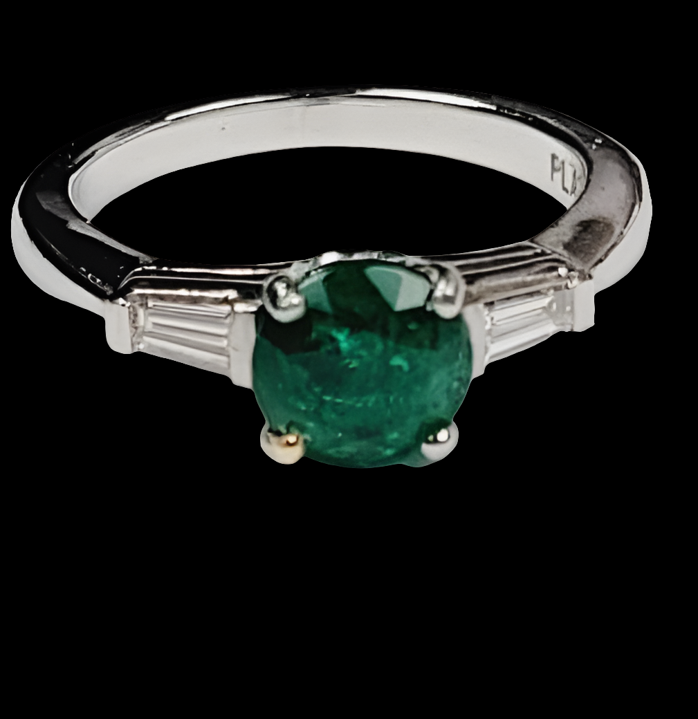Emerald and tapering baguette diamond engagement ring
SKU: 5299