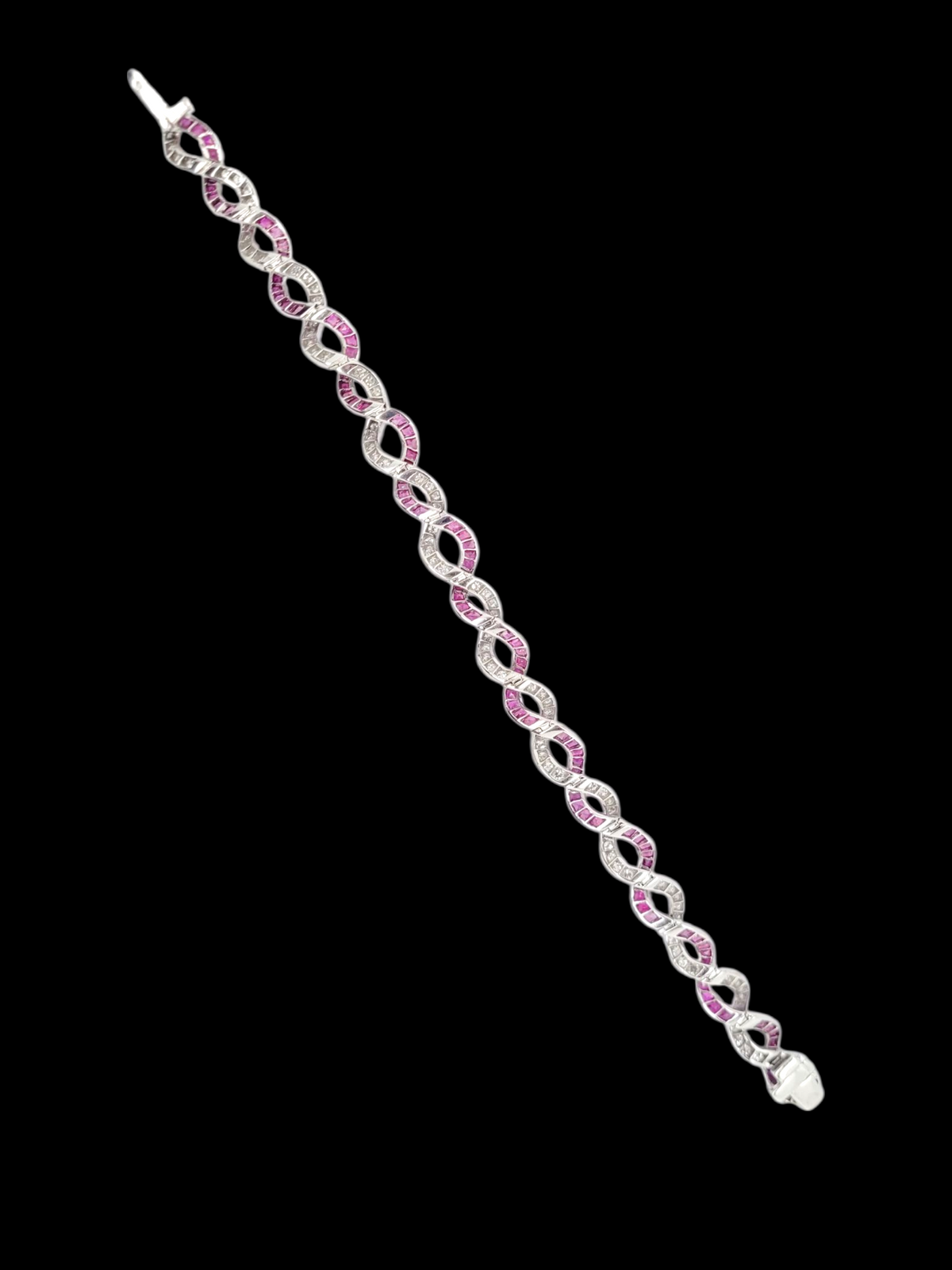 Fine entwined ruby and diamond bracelet
SKU: 8331