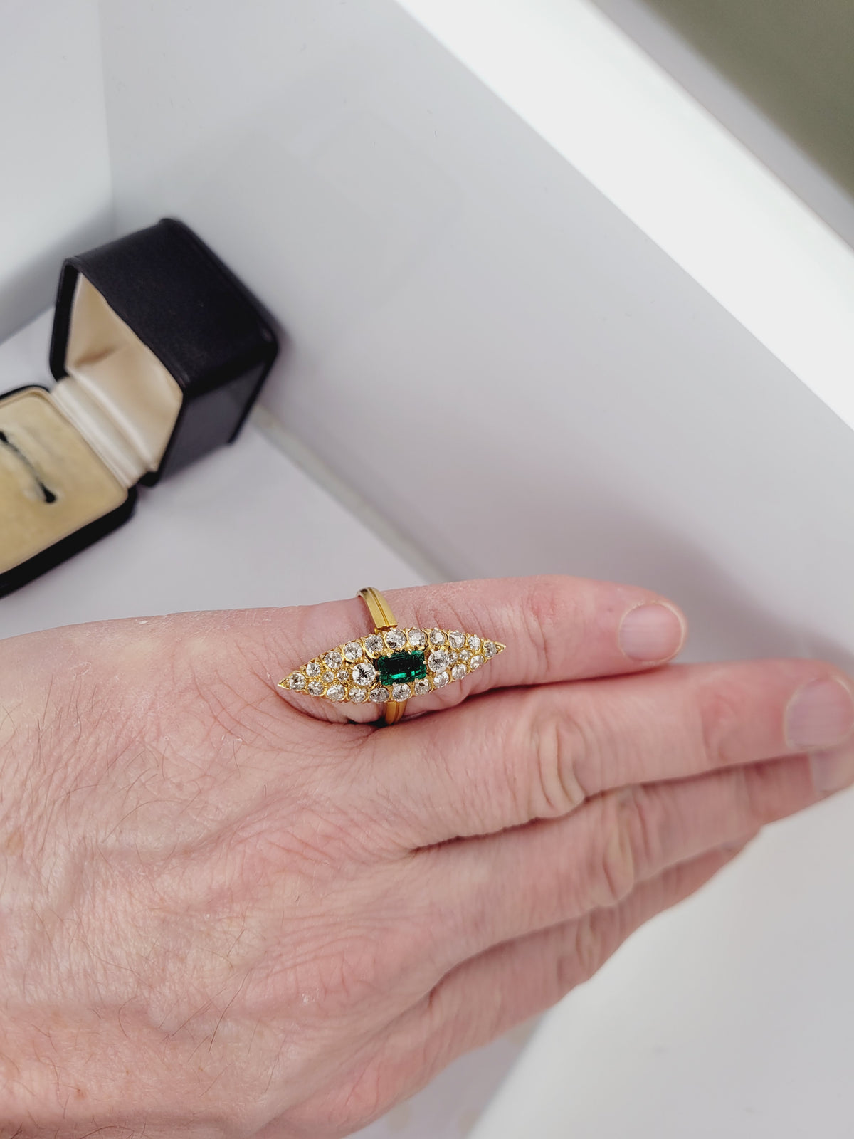 Antique emerald and diamond navette shaped ring
sku 8544