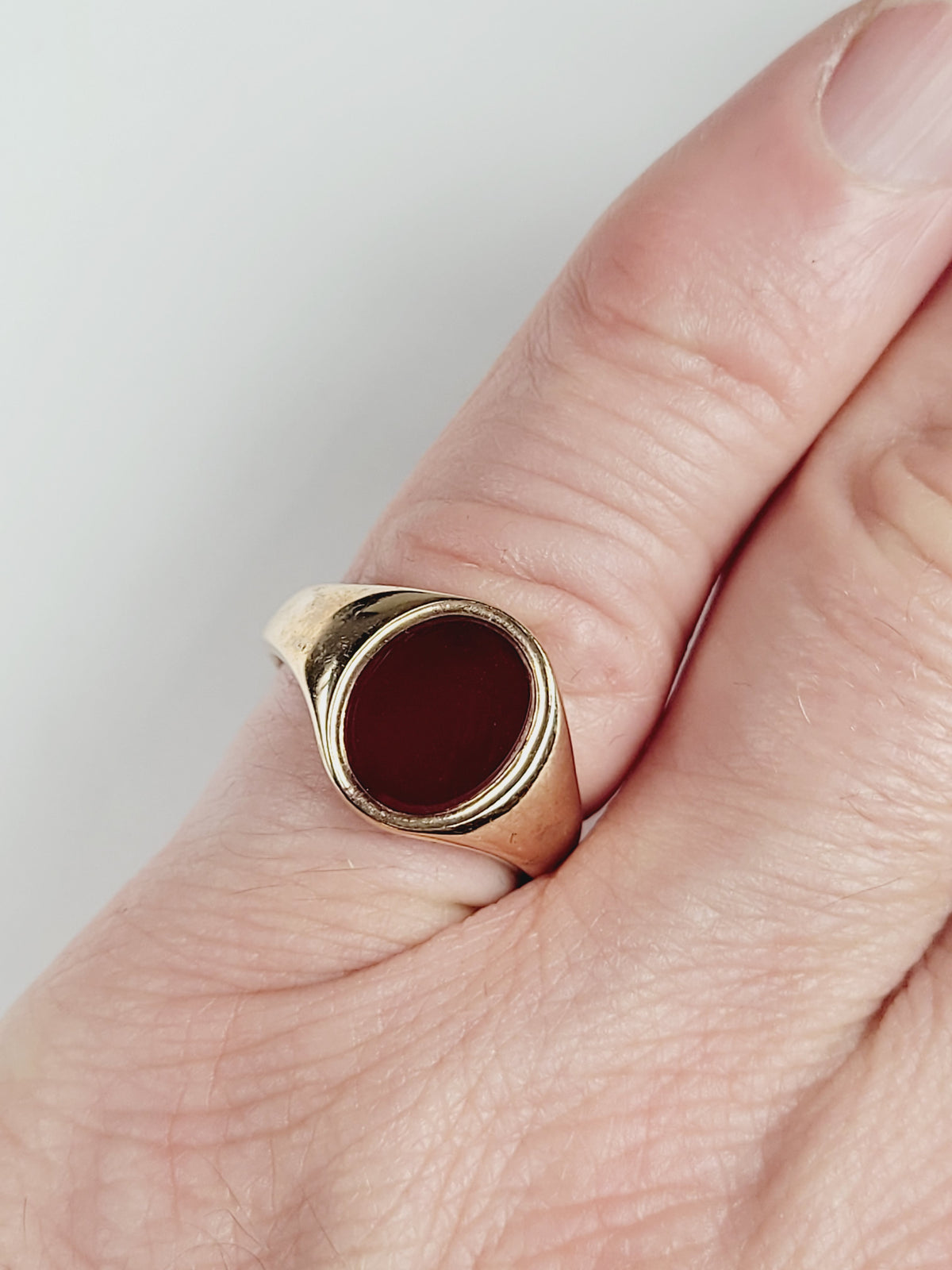 Dark red oval cornelian 9ct gold signet ring sku 8447
