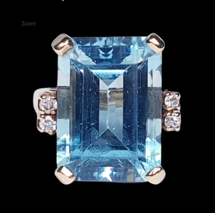 Blue topaz and diamond dress ring
SKU: 4533