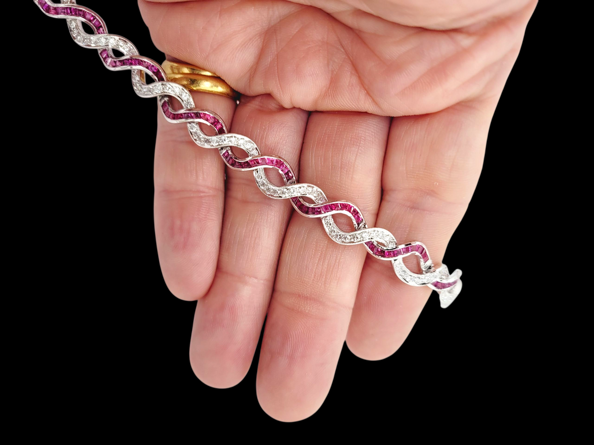 Fine entwined ruby and diamond bracelet
SKU: 8331