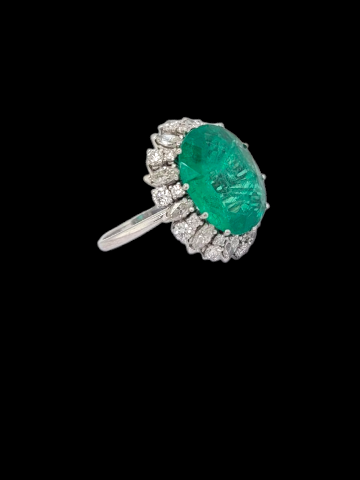 Large Columbian emerald and diamond cluster ring
SKU: 8102