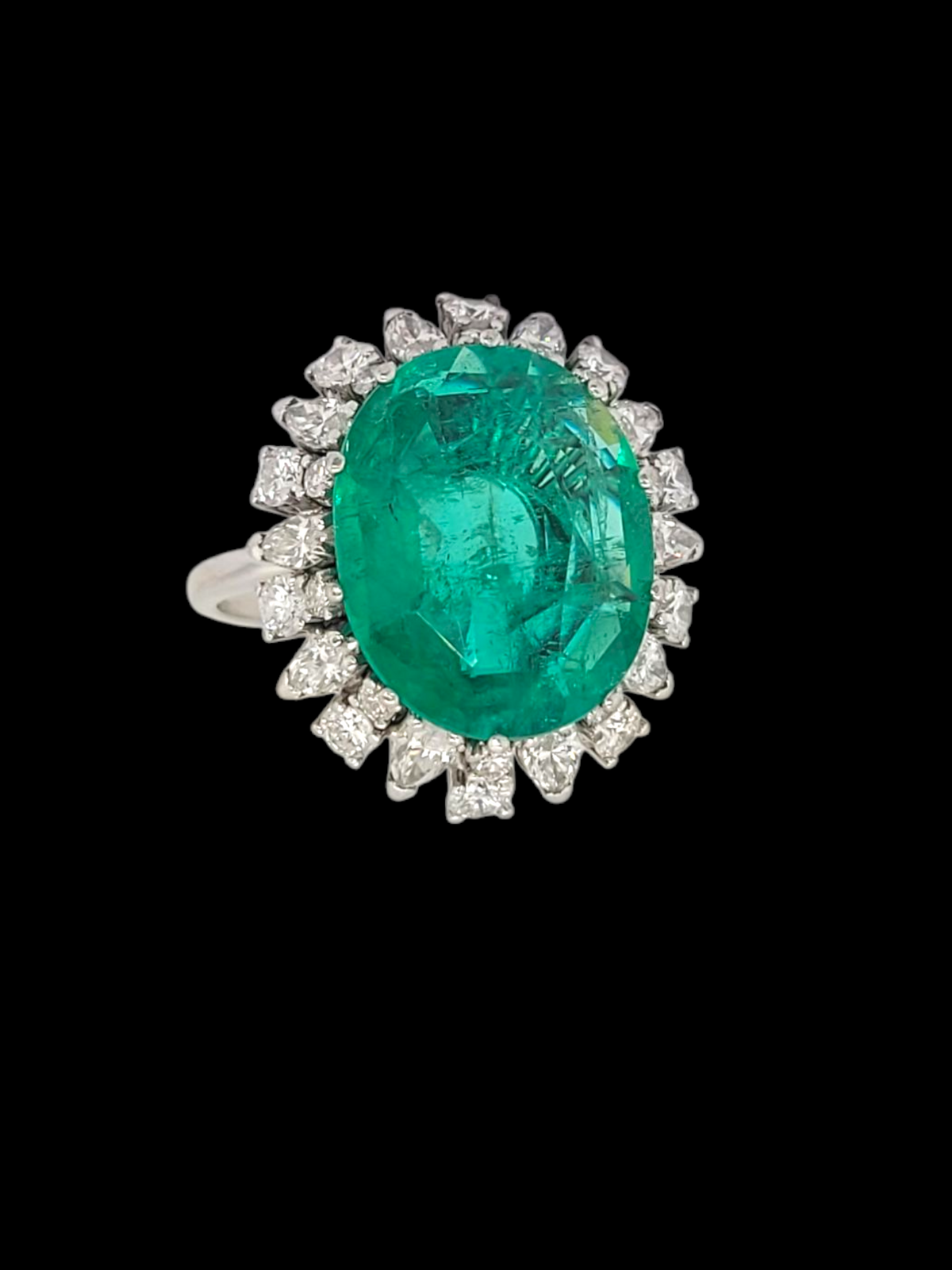 Large Columbian emerald and diamond cluster ring
SKU: 8102
