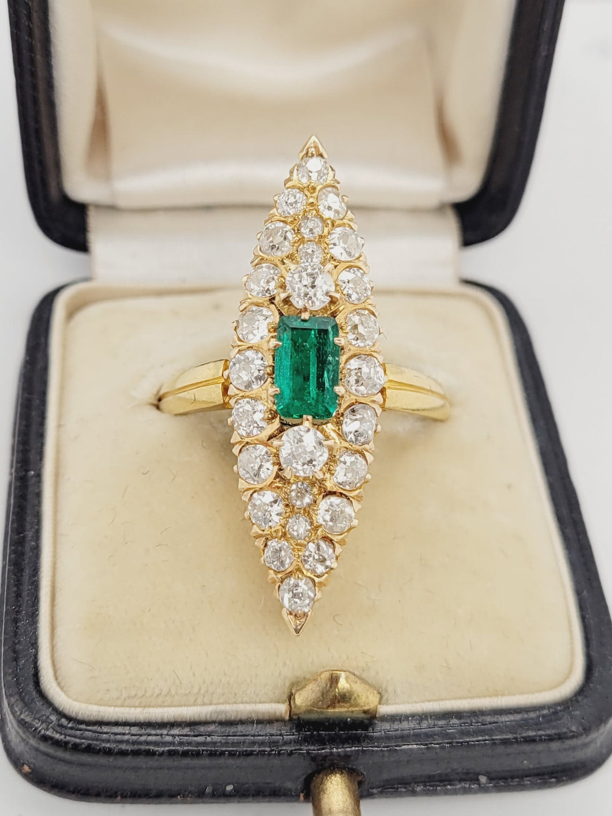 Antique emerald and diamond navette shaped ring
sku 8544