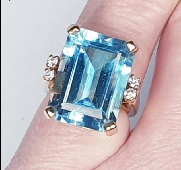 Blue topaz and diamond dress ring
SKU: 4533