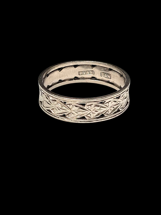Rare open work and engraved platinum wedding band
SKU: 8125