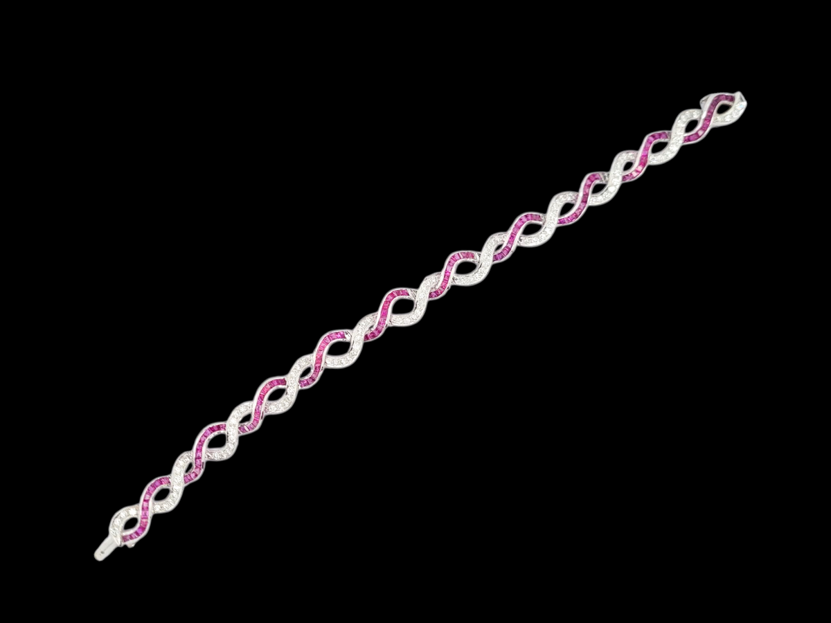 Fine entwined ruby and diamond bracelet
SKU: 8331