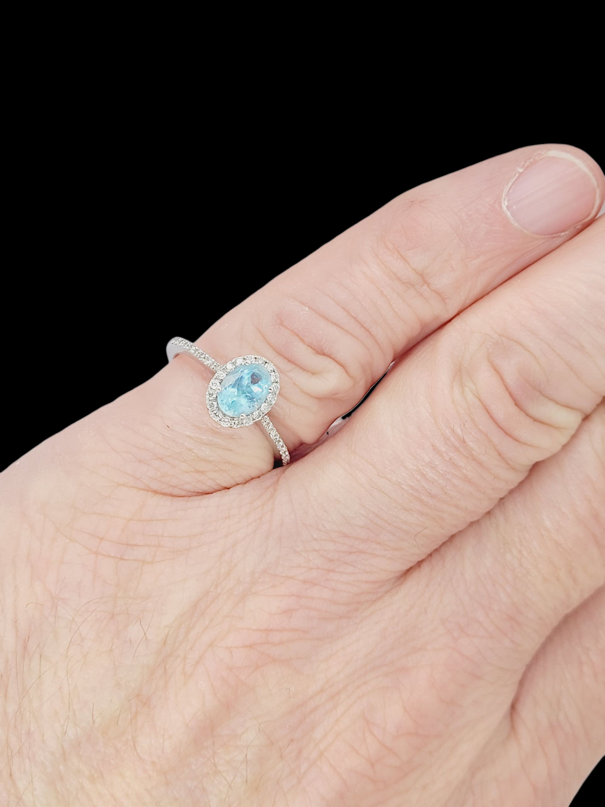 Oval aquamarine and diamond cluster ring
SKU: 8414