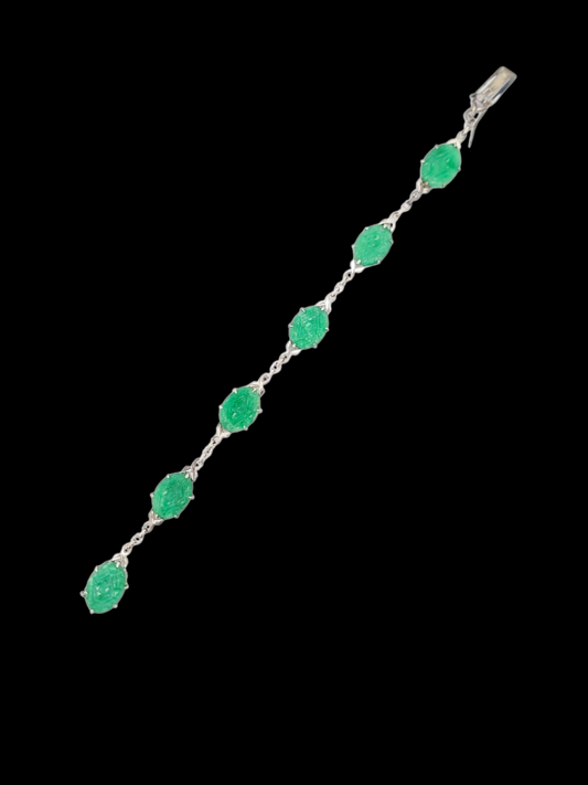 Art deco carved jade bracelet
SKU: 8034